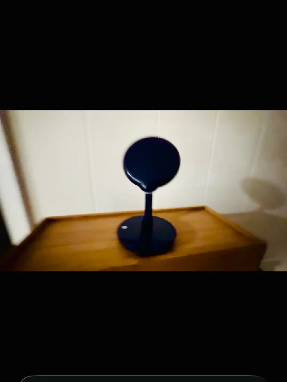 Blue Countertop Makeup Mirror, adjustable arm, lights on mirror.